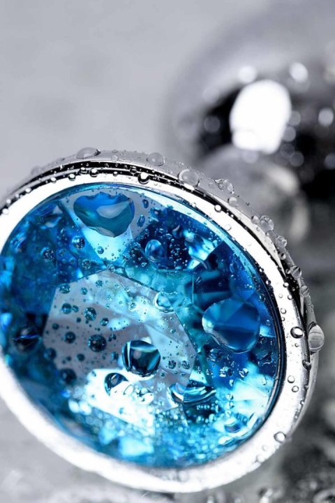 Silver anal plug TOYFA Metal,with a Topaz color gem